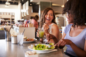 two women eating healthy